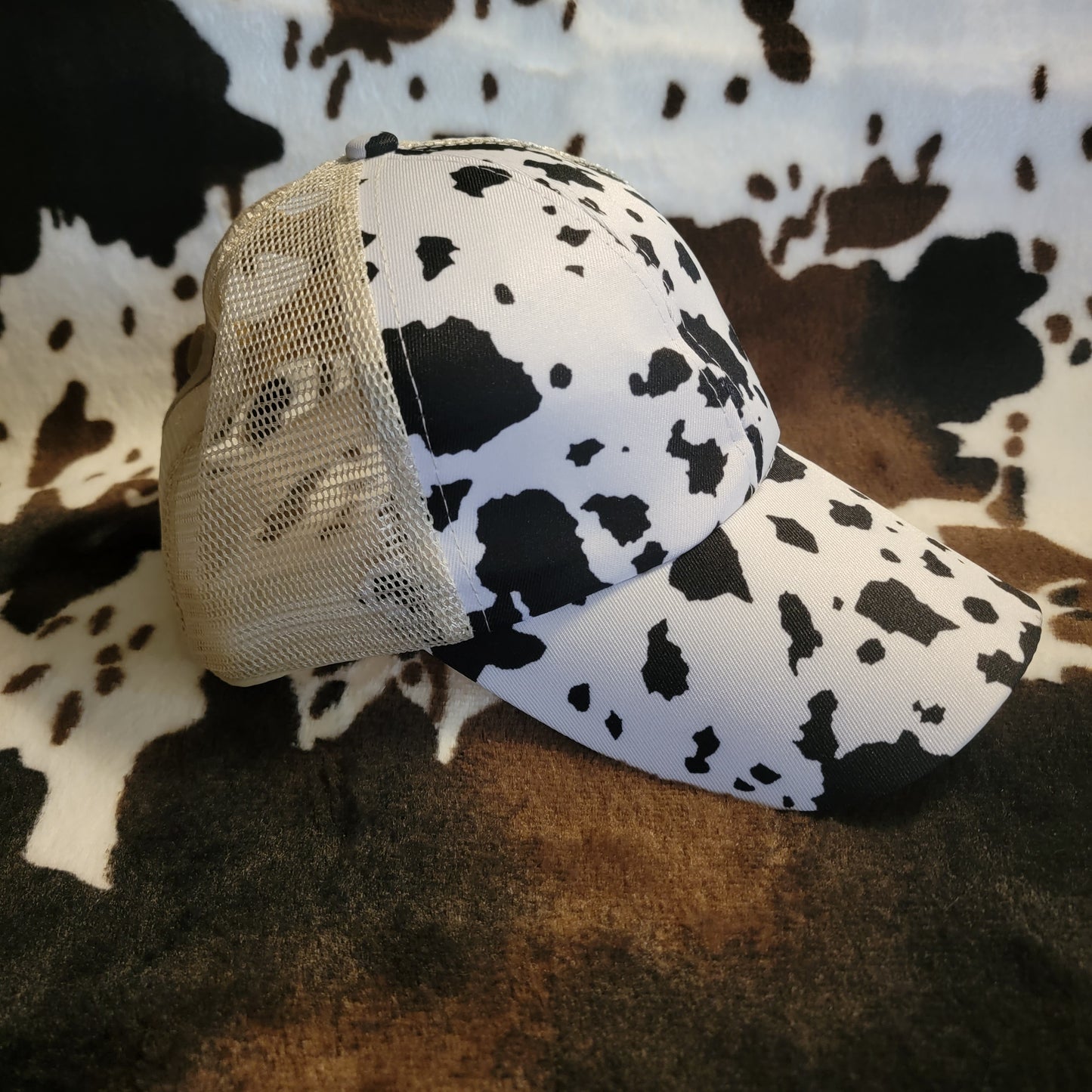 White Cow Print Criss Cross Ponytail Hat
